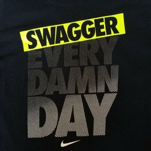 The Nike Tee athletic cut with the print Swagger E